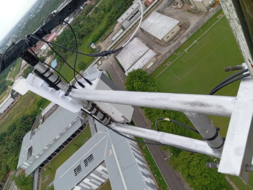 Installed radio equipment overlooking an industrial facility